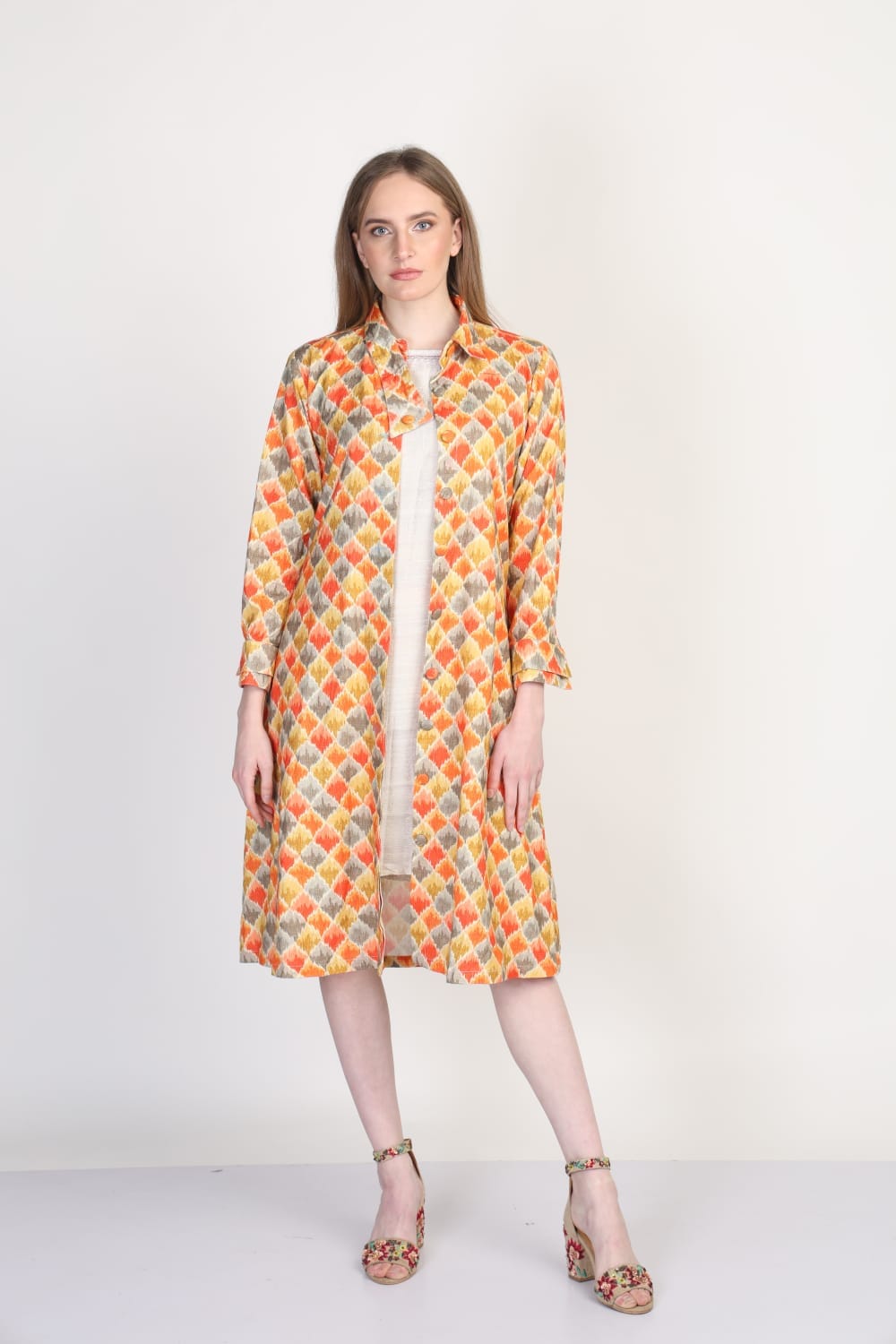 Stylish long ethnic jacket featuring traditional print and cotton linen fabric, perfect for layering over traditional or contemporary outfits