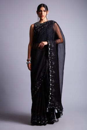Black Organza Sari, adorned with intricate silver zari, silk thread, cutdana, and stone embellishments.